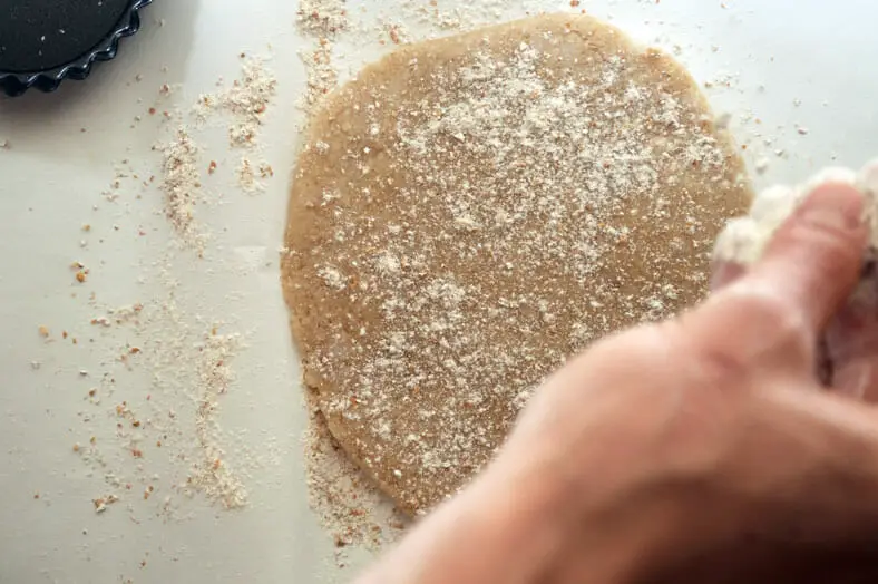 rolling out the dough for a vegan apple pie crust