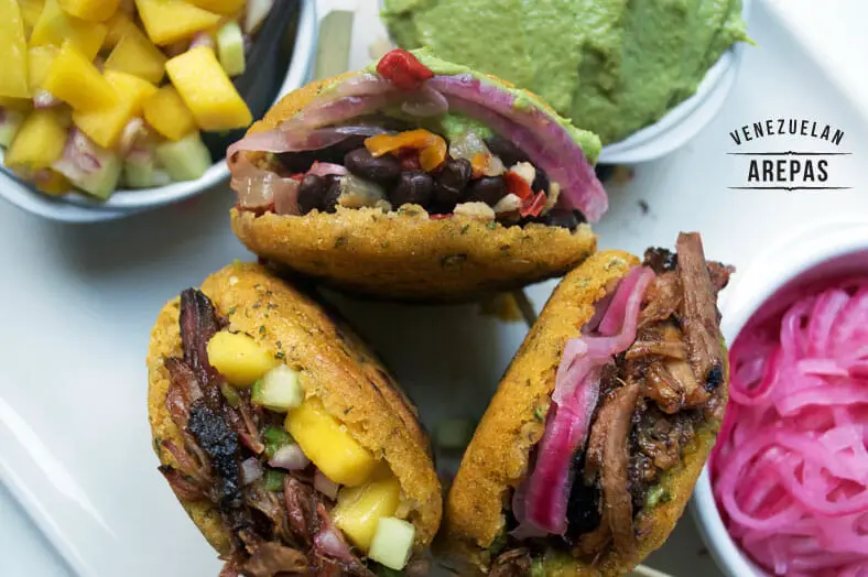 Here are a few different types of arepas rellenas, a Venezuelan corn cakes that can be filled with different combinations of yummy meats, veggies and sauces