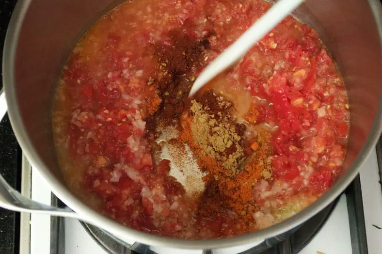 To make Encebollado, a spicy tuna and onion stew, widely regarded as the national dish of Ecuador, start by frying your diced onions, tomatoes, paprika, cumin and cayenne